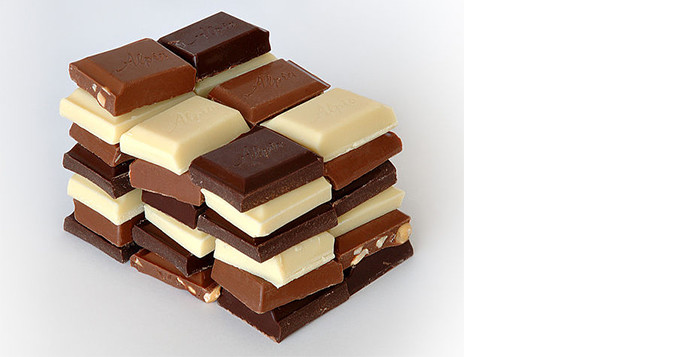 Stack of dark, white and milk chocolate. Credit: André Karwath, via Wikimedia