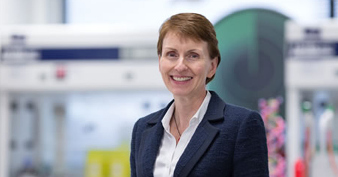 Helen Sharman standing in a laboratory