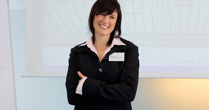 Entrepreneur scientist standing in front of a large chart