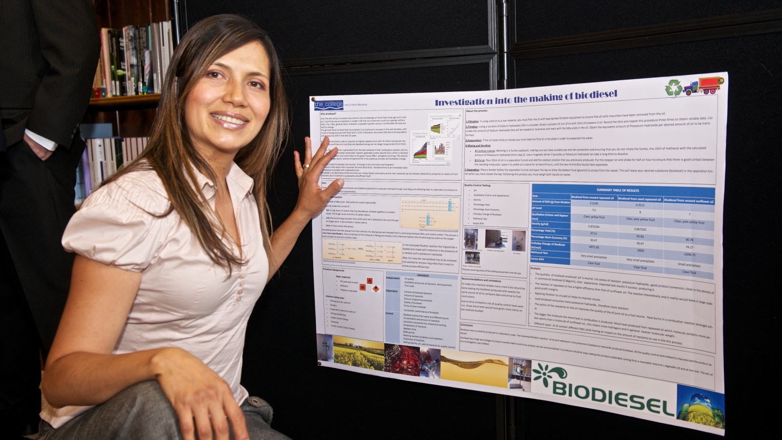 Female scientist with her poster