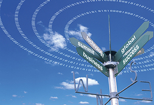 Signpost indicating the words: technology, summit, business, global and success against a bright blue sky with few clouds
