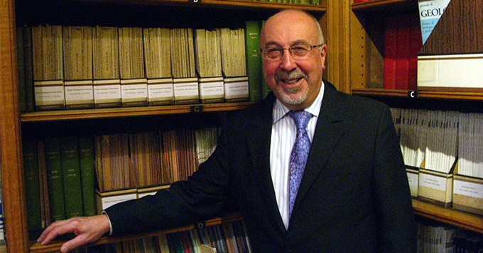 Portrait of Edmund Nickless (Science Council trustee) in a library