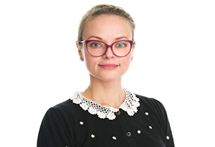 Portrait photo of Karolina RSci against a plain white background
