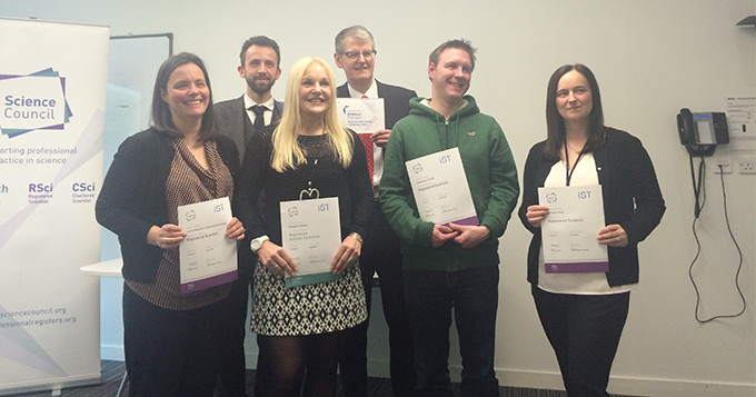 Employer Champion launch event at University of Strathclyde. In the photo are four registrants receiving their registration certificates.