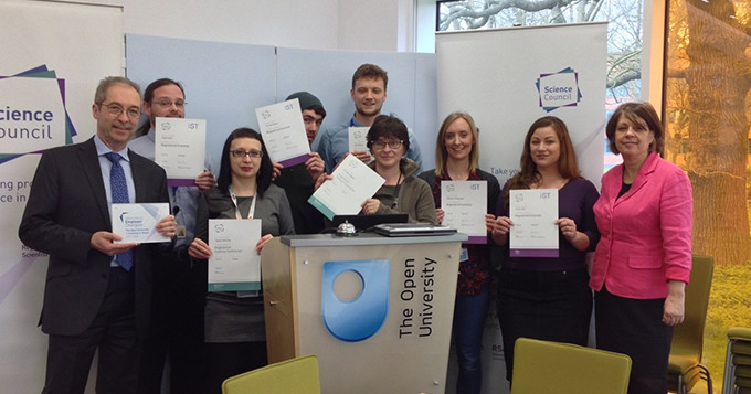 Photo of Employer Champion launch event at The Open University with registrants receiving their certificates