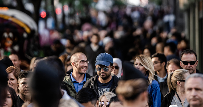 Crowds of people walking - demonstrating Public Benefit Declaration