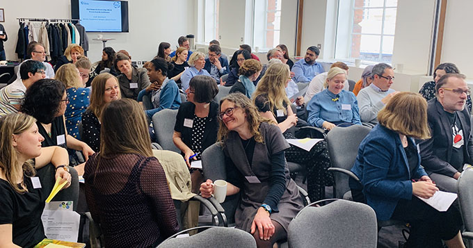 Discussion between delegates at the Prizes, Awards and Grants workshop