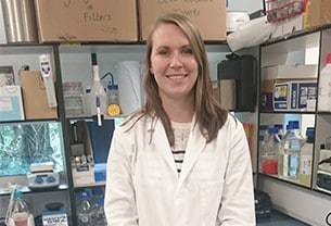 Portrait photo of Registered Scientist Jemma in a laboratory